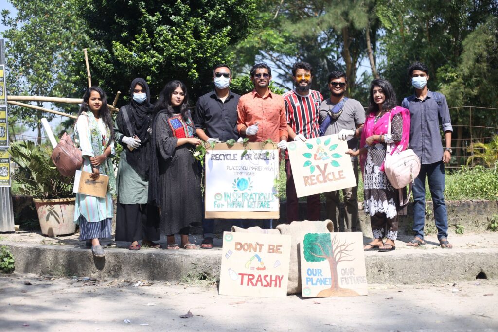 People standing holding banners and posters