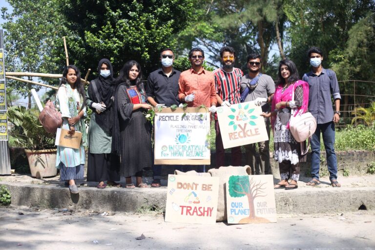 People standing holding banners and posters